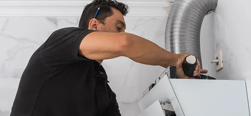 Precision In-wall Dryer Vent Cleaning & Rerouting Corrections in Redmond, OR